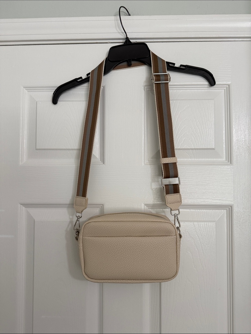 Cream Crossbody Bag with Adjustable Brown Stripe Strap